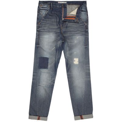 Mid wash twist seam carrot jeans