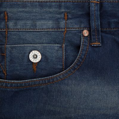 Mid wash denim twist seam jeans