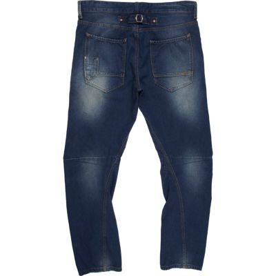 Mid wash denim twist seam jeans