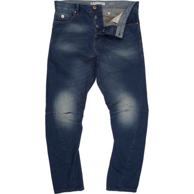 Mid wash denim twist seam jeans