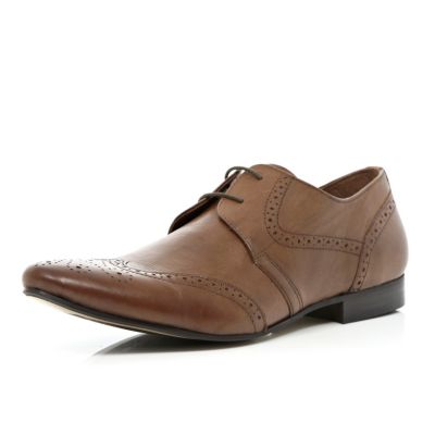 Tan point brogues