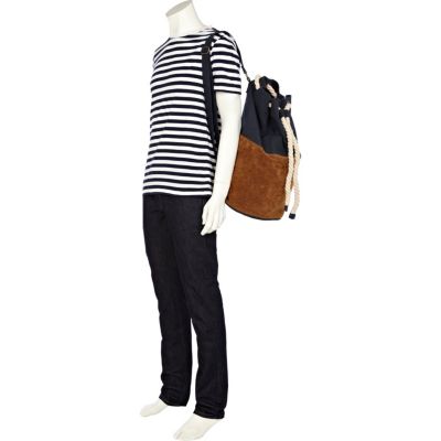 Navy and tan suede duffle bag