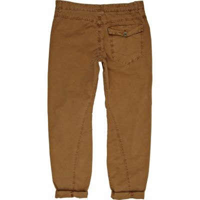 Brown twist seam carrot trousers