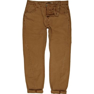 Brown twist seam carrot trousers