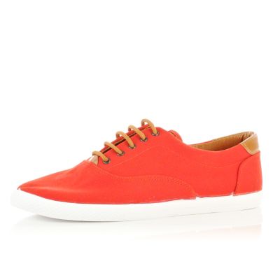 Red and tan contrast plimsolls