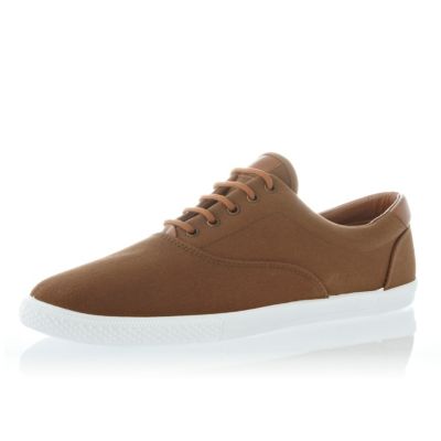 Brown lace up plimsolls