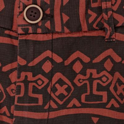 Rust tribal print shorts