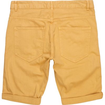 Yellow stretch skinny shorts