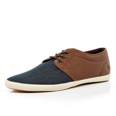 Blue denim and brown plimsolls