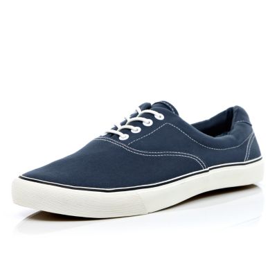 Blue canvas lace up trainers