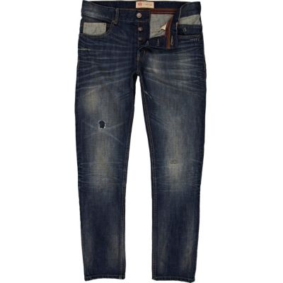 Dark wash distressed Dylan slim jeans
