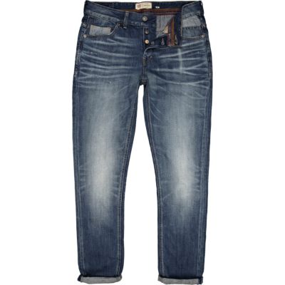 Mid wash distressed Dylan slim jeans