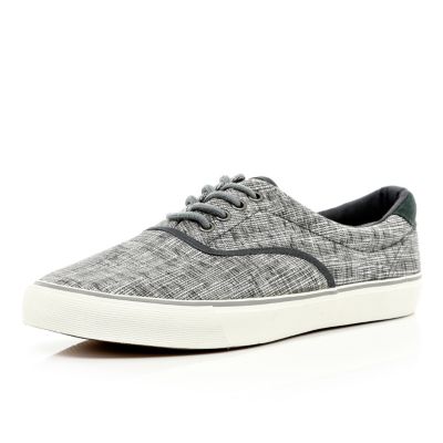 Grey cross print lace up trainers