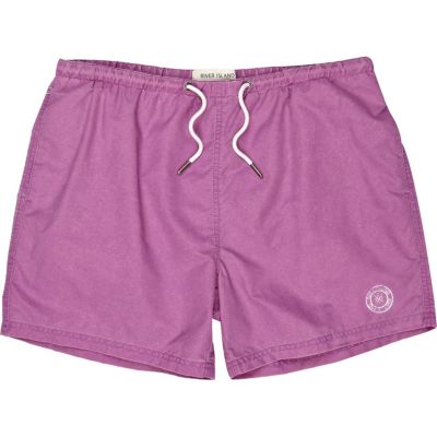 Bright purple swim shorts