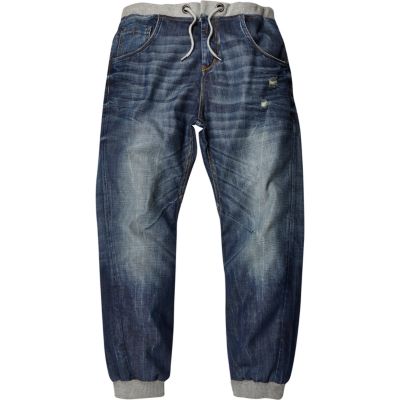 Mid wash distressed Ryan jogger jeans