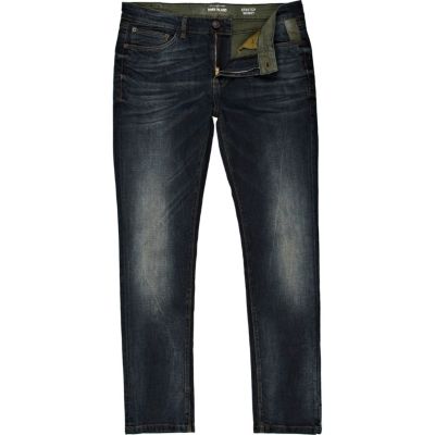 Dark wash distressed Sid skinny stretch jeans
