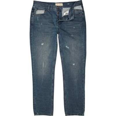 Mid wash distressed Dylan slim jeans