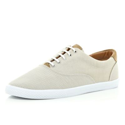 Stone canvas lace up trainers