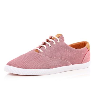 Red canvas lace up trainers