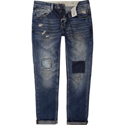 Mid wash distressed Dylan slim jeans
