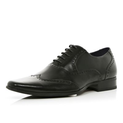 Black lace up pointed smart brogues