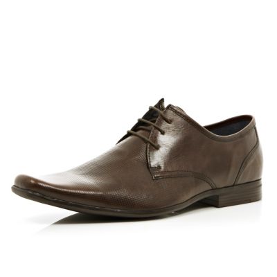 Brown perforated lace up shoes