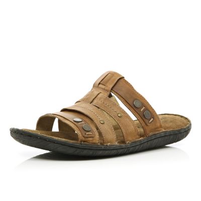 Light brown studded strap slip on sandals