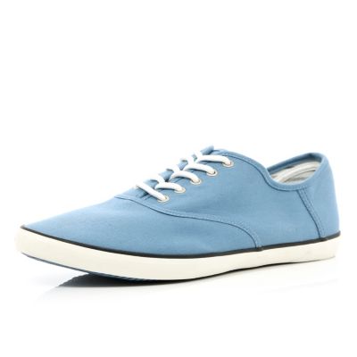 Light blue canvas lace up plimsolls