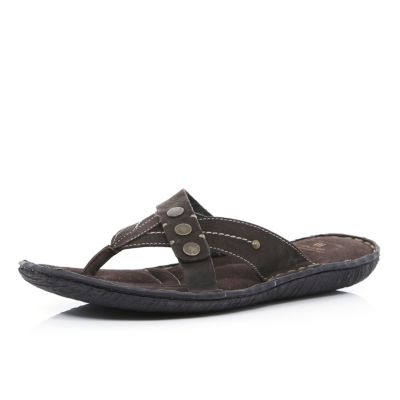 Brown cross over studded flip flops