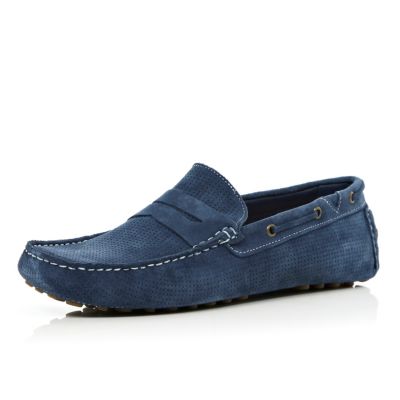 Blue suede perforated boat shoes