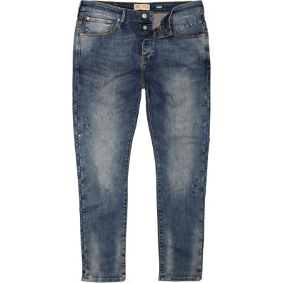 Mid wash Flynn skinny jeans