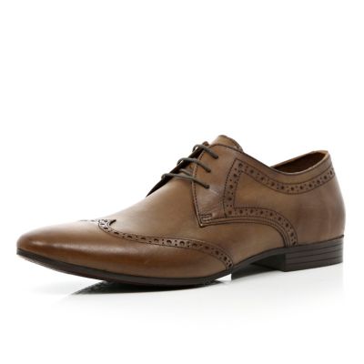 Brown pointed brogues