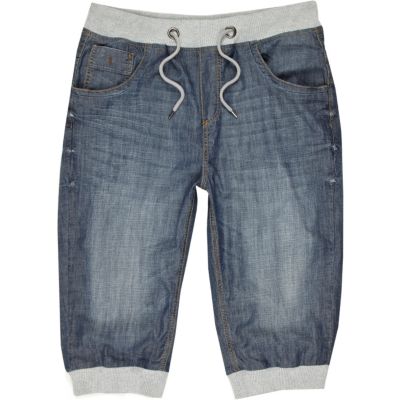 Mid wash distressed cropped jogger jeans