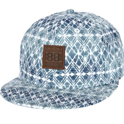 Light wash bleached denim and suede flat cap