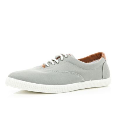Grey lace up plimsolls