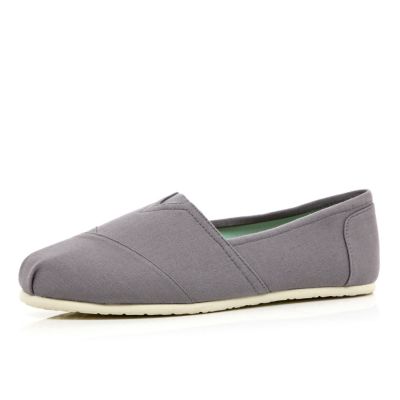 Grey slip on plimsolls