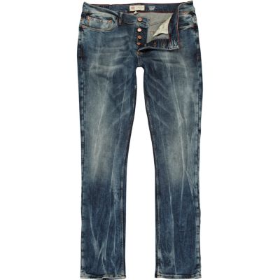 Mid wash bleached Sid skinny stretch jeans