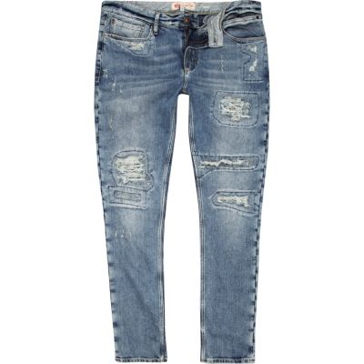 Light wash ripped Flynn skinny jeans