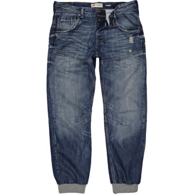 Mid wash distressed Ryan jogger jeans