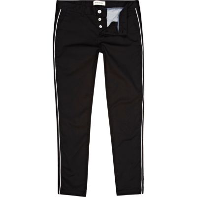 Black and white piped skinny chinos