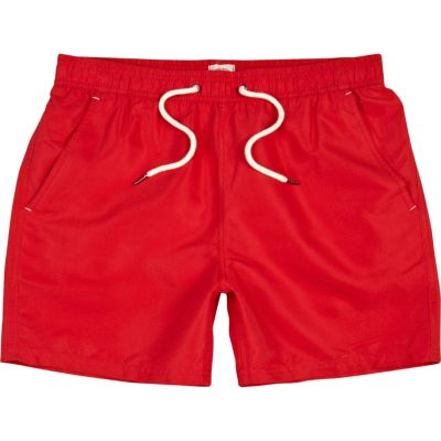 Bright red swim shorts