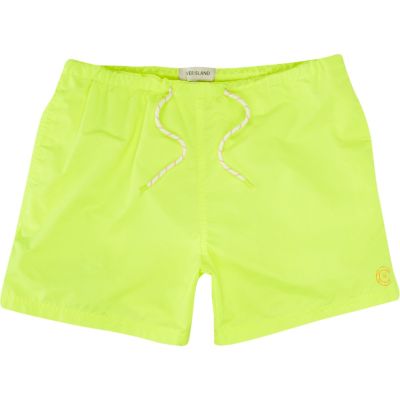 Neon yellow swim shorts