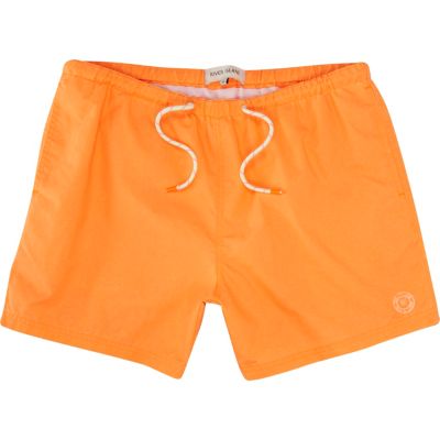 Neon orange swim shorts