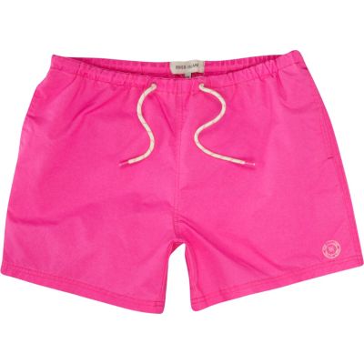 Neon pink swim shorts