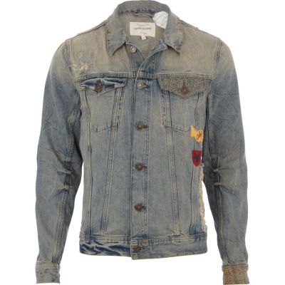 Mid wash distressed badge denim jacket