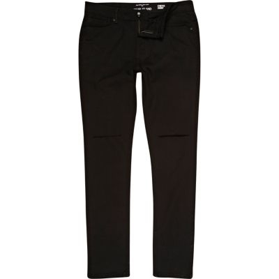 Black ripped Flynn skinny jeans