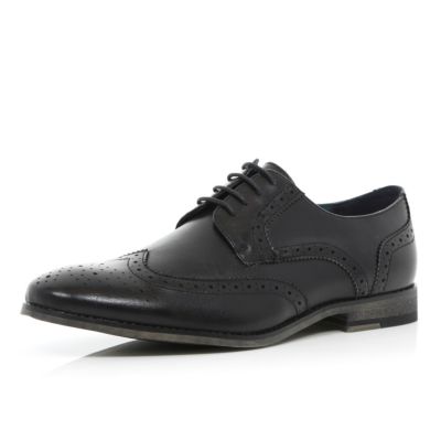 Black formal brogues