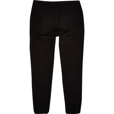 Pantalon de survêtement noir à chevilles resserrées