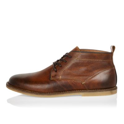 Brown leather lace up desert boots