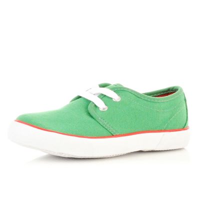 Boys green plimsolls